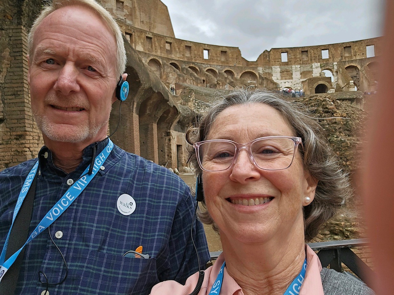 Couple visits the Colosseum